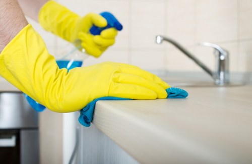 Cleaner preparing a Waterloo commercial property for carpet maintenance